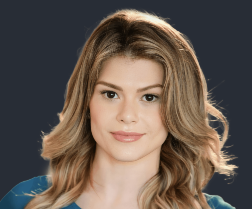Portrait of comedian Manu Maciel, Brazilian actress and stand-up performer, with long wavy hair and a confident smile – NYC comedy tour promotion